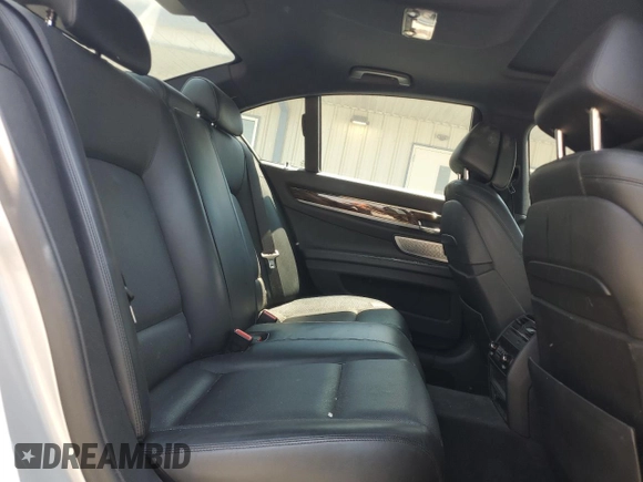 2013 BMW 7 Series 750i with VIN WBAYA8C58DC996865, listed as a Copart auction lot 61831294 with 151,238 mi miles and Salvage Title. Bid and sale history available at DreamBid. Image 10.
