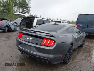 2022 Ford Mustang GT with VIN 1FA6P8CF1N5108602, listed as a IAAI auction lot 39889660 with 21,711 mi miles and . Bid and sale history available at DreamBid. Image 4.