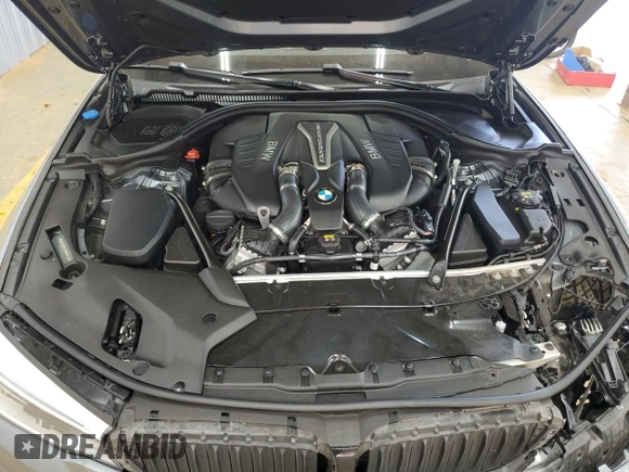 2018 BMW 5 Series M550i xDrive with VIN WBAJB9C55JB050213, listed as a Copart auction lot 61714255 with 34,700 mi miles and Salvage title. Bid and sale history available at DreamBid. Image 11.