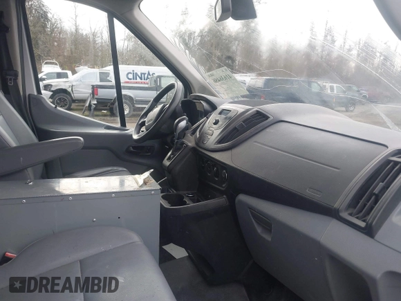 2016 Ford Transit Cargo with VIN 1FTYR2CM1GKB06300, listed as a IAAI auction lot 41636486 with 159,916 mi miles and . Bid and sale history available at DreamBid. Image 5.