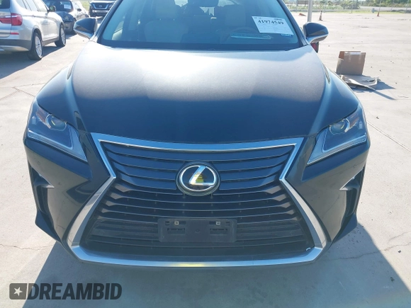 2016 Lexus RX 350 with VIN 2T2ZZMCA9GC012233, listed as a IAAI auction lot 41974549 with 84,960 mi miles and . Bid and sale history available at DreamBid. Image 6.