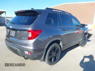 2019 Honda Passport Elite z VIN 5FNYF8H07KB015720, wystawiony jako IAAI lot #41221298 z przebiegiem 65 747 mil mil oraz . Historia ofert i sprzedaży dostępna na DreamBid. Obrazek 4.