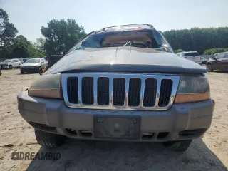 1999 Jeep Grand Cherokee Laredo с VIN 1J4G258S9XC758711, выставлен на аукционе Copart как лот 58420835 с пробегом Не указан миль и Списание • Salvage title. История ставок и продаж доступна на DreamBid. Изображение 5.