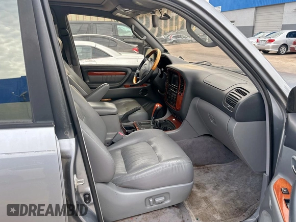 2001 Lexus LX 470 z VIN JTJHT00W313508801, wystawiony jako Copart lot #60938545 z przebiegiem 118 013 mil mil oraz Czysty tytuł • Clean title. Historia ofert i sprzedaży dostępna na DreamBid. Obrazek 5.