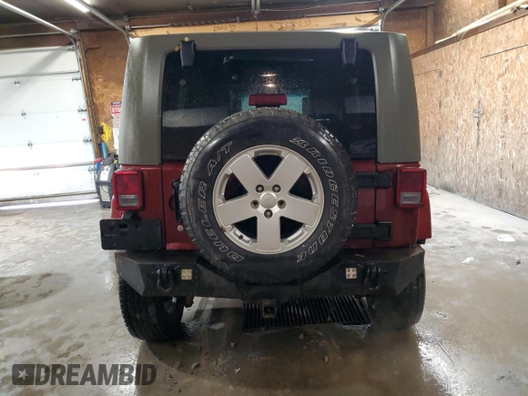 2007 Jeep Wrangler Unlimited Sahara with VIN 1J4GA59197L104784, listed as a Copart auction lot 56700205 with 156,382 mi miles and Salvage title. Bid and sale history available at DreamBid. Image 6.