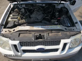 2002 Ford Explorer Sport Trac Value с VIN 1FMZU77E02UC24219, выставлен на аукционе Copart как лот 60695915 с пробегом 102 208 миль миль и Чистый • Clean title. История ставок и продаж доступна на DreamBid. Изображение 11.