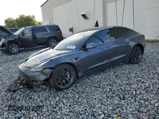 2023 Tesla Model 3 z VIN 5YJ3E1EA8PF394011, wystawiony jako Copart lot #60981335 z przebiegiem 52 220 mil mil oraz Nie do naprawy • Non repairable. Historia ofert i sprzedaży dostępna na DreamBid. Obrazek 1.