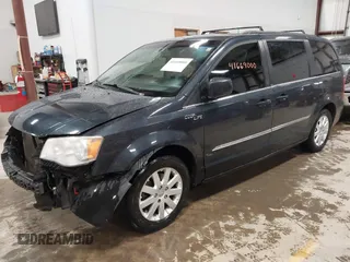 2014 Chrysler Town & Country Touring z VIN 2C4RC1BG4ER158210, wystawiony jako IAAI lot #41669000 z przebiegiem 221 734 mil mil oraz . Historia ofert i sprzedaży dostępna na DreamBid. Obrazek 2.