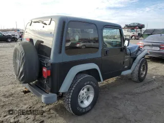 2002 Jeep Wrangler Sport with VIN 1J4FA49S32P758082, listed as a Copart auction lot 80692073 with 148,784 mi miles and Salvage Title. Bid and sale history available at carsss.com. Image 3.