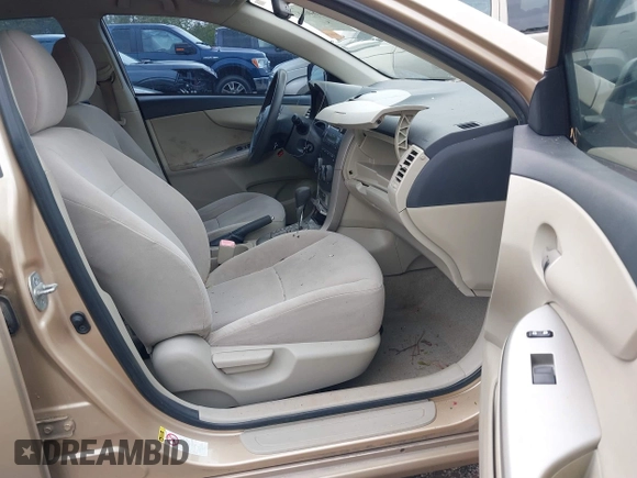 2011 Toyota Corolla L with VIN JTDBU4EE7B9127447, listed as a IAAI auction lot 41840687 with 183,783 mi miles. Bid and sale history available at carsss.com. Image 5.