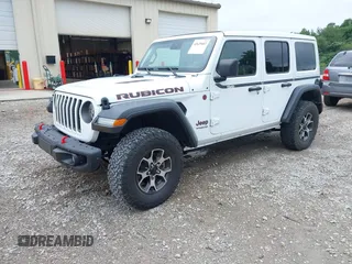 2021 Jeep Wrangler Unlimited Rubicon with VIN 1C4JJXFM9MW774142, listed as a IAAI auction lot 42625007 with 42,318 mi miles and . Bid and sale history available at DreamBid. Image 17.