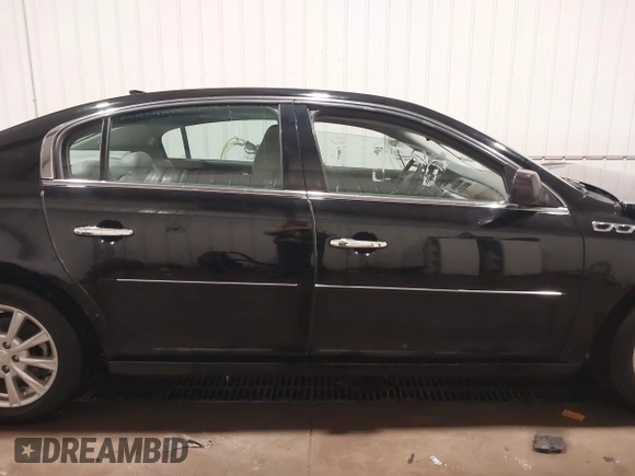 2011 Buick Lucerne CXL with VIN 1G4HC5EM7BU112210, listed as a IAAI auction lot 41502729 with 123,047 mi miles and . Bid and sale history available at carsss.com. Image 13.