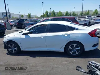 2020 Honda Civic LX with VIN 2HGFC2F67LH511473, listed as a IAAI auction lot 42614633 with 91,822 mi miles and . Bid and sale history available at DreamBid. Image 15.
