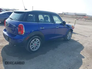 2015 MINI Countryman with VIN WMWZB3C56FWR43443, listed as a IAAI auction lot 41920848 with 91,192 mi miles and . Bid and sale history available at DreamBid. Image 4.