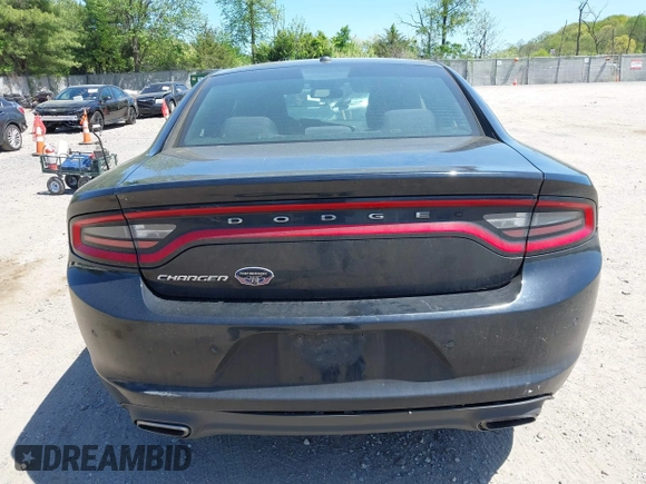 2015 Dodge Charger SE with VIN 2C3CDXBG9FH790573, listed as a IAAI auction lot 42142908 with 195,182 mi miles and . Bid and sale history available at carsss.com. Image 16.
