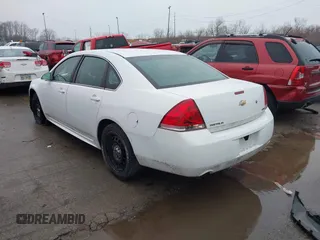 2014 Chevrolet Impala Limited Police Police with VIN 2G1WD5E3XE1174984, listed as a IAAI auction lot 41627964 with 90,077 mi miles. Bid and sale history available at carsss.com. Image 3.