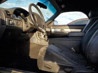 2003 Ford Thunderbird Deluxe z VIN 1FAHP60A43Y111849, wystawiony jako Copart lot #76742564 z przebiegiem Nie podano mil oraz Szkoda całkowita • Salvage title. Historia ofert i sprzedaży dostępna na DreamBid. Obrazek 7.