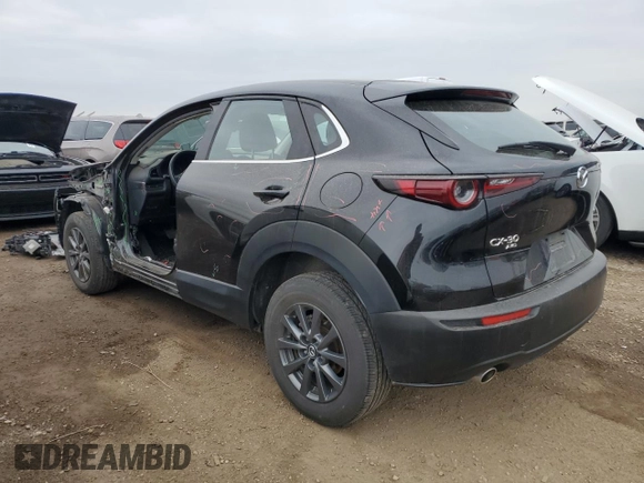 2023 Mazda CX-30 S with VIN 3MVDMBAM6PM549095, listed as a Copart auction lot 53027665 with 53,804 mi miles and Salvage title. Bid and sale history available at DreamBid. Image 2.