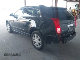 2011 Cadillac SRX Luxury Collection z VIN 3GYFNAEY9BS653352, wystawiony jako IAAI lot #42345078 z przebiegiem 118 030 mil mil oraz . Historia ofert i sprzedaży dostępna na DreamBid. Obrazek 3.