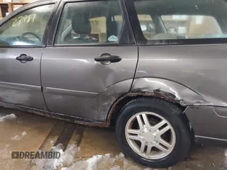 2005 Ford Focus SE with VIN 1FAFP36N45W158796, listed as a IAAI auction lot 41823987 with 145,803 mi miles and . Bid and sale history available at carsss.com. Image 6.