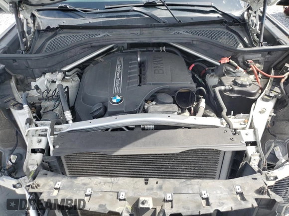 2015 BMW X5 xDrive35i z VIN 5UXKR0C58F0P03231, wystawiony jako Copart lot #60964305 z przebiegiem 71 419 mil mil oraz Szkoda całkowita • Salvage title. Historia ofert i sprzedaży dostępna na DreamBid. Obrazek 12.