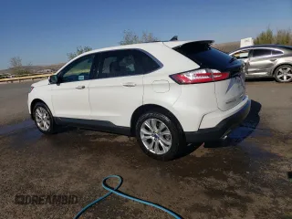 2021 Ford Edge Titanium with VIN 2FMPK4K91MBA27073, listed as a Copart auction lot 51776575 with 113,559 mi miles and Clean title. Bid and sale history available at DreamBid. Image 2.