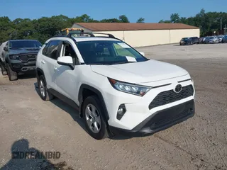 2019 Toyota RAV4 XLE with VIN JTMP1RFV0KD020442, listed as a IAAI auction lot 40108049 with 70,916 mi miles and . Bid and sale history available at DreamBid. Image 1.
