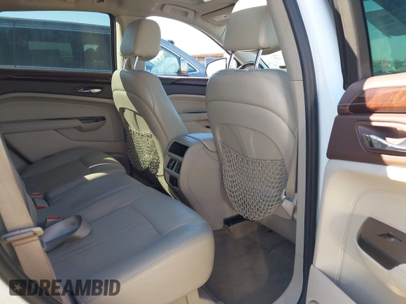2012 Cadillac SRX Luxury Collection with VIN 3GYFNAE37CS597594, listed as a IAAI auction lot 41647807 with 193,836 mi miles and . Bid and sale history available at carsss.com. Image 8.