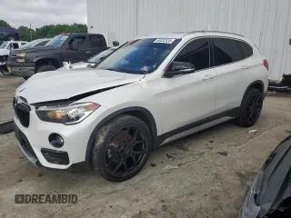 2019 BMW X1 xDrive28i with VIN WBXHT3C52K3H34021, listed as a Copart auction lot 64032535 with 30,752 mi miles and Salvage title. Bid and sale history available at DreamBid. Image 1.