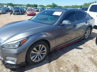 2015 Infiniti M Hybrid with VIN JN1EY1AP2FM510029, listed as a IAAI auction lot 41795913 with 152,475 mi miles. Bid and sale history available at carsss.com. Image 14.