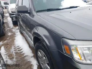 2011 Mercury Mariner with VIN 4M2CN9BG5BKJ03462, listed as a IAAI auction lot 41770084 with 120,508 mi miles. Bid and sale history available at carsss.com. Image 12.