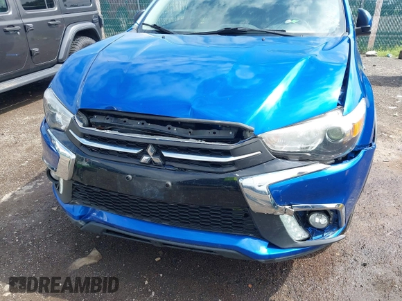 2018 Mitsubishi Outlander SE with VIN JA4AR3AW6JU000961, listed as a IAAI auction lot 42720633 with 124,554 mi miles and . Bid and sale history available at DreamBid. Image 6.