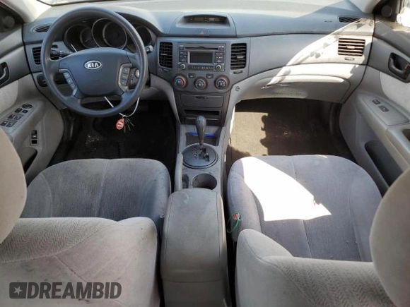 2010 Kia Optima LX z VIN KNAGG4A86A5426444, wystawiony jako Copart lot #61498275 z przebiegiem 166 526 mil mil oraz Czysty tytuł • Clean title. Historia ofert i sprzedaży dostępna na DreamBid. Obrazek 8.