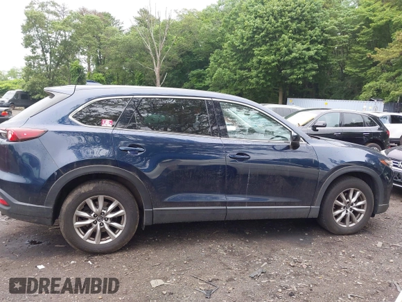 2019 Mazda CX-9 Touring with VIN JM3TCBCY6K0334898, listed as a IAAI auction lot 42467677 with 69,454 mi miles and . Bid and sale history available at DreamBid. Image 13.