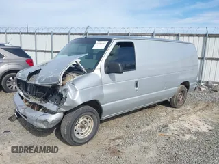 1998 Ford Econoline Cargo with VIN 1FTRE1428WHB30628, listed as a IAAI auction lot 41706164 with 153,223 mi miles. Bid and sale history available at carsss.com. Image 2.