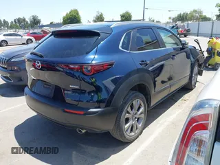 2023 Mazda CX-30 S Select with VIN 3MVDMBBM3PM514030, listed as a IAAI auction lot 42326959 with 41,226 mi miles and . Bid and sale history available at DreamBid. Image 4.