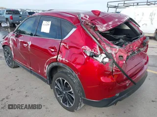 2023 Mazda CX-5 2.5 S Premium Package with VIN JM3KFBDM7P0165741, listed as a IAAI auction lot 41343299 with 35,684 mi miles. Bid and sale history available at carsss.com. Image 3.