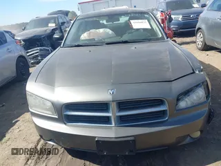 2009 Dodge Charger SXT with VIN 2B3KA33V29H627209, listed as a IAAI auction lot 41666032 with 189,916 mi miles and . Bid and sale history available at carsss.com. Image 13.