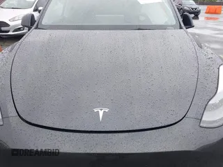 2024 Tesla Model Y Long Range with VIN 7SAYGDEE5RA241433, listed as a IAAI auction lot 41569277 with 7,490 mi miles. Bid and sale history available at carsss.com. Image 10.