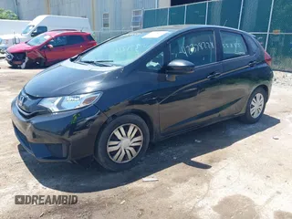 2015 Honda Fit LX z VIN 3HGGK5H56FM712266, wystawiony jako IAAI lot #42378228 z przebiegiem 140 423 mil mil oraz . Historia ofert i sprzedaży dostępna na DreamBid. Obrazek 17.
