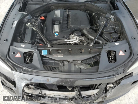 2011 BMW 7 Series 740Li with VIN WBAKB4C53BC574284, listed as a Copart auction lot 86628084 with 77,760 mi miles and Salvage title. Bid and sale history available at DreamBid. Image 13.