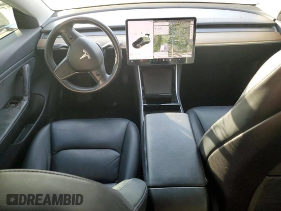 2019 Tesla Model 3 Mid Range with VIN 5YJ3E1EA9KF412525, listed as a Copart auction lot 48689825 with 134,768 mi miles and Salvage Title. Bid and sale history available at DreamBid. Image 8.
