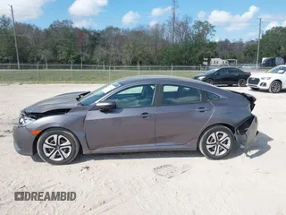 2017 Honda Civic LX with VIN 19XFC2F51HE036153, listed as a IAAI auction lot 41546498 with 78,726 mi miles and . Bid and sale history available at DreamBid. Image 14.