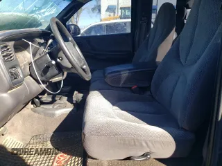 1999 Dodge Dakota SLT with VIN 1B7GG22X0XS239398, listed as a Copart auction lot 80143414 with 147,646 mi miles and Salvage Title. Bid and sale history available at DreamBid. Image 7.