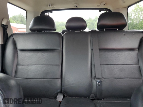2005 Ford Escape Limited с VIN 1FMCU94145KC93868, выставлен на аукционе Copart как лот 59668795 с пробегом 202 940 миль миль и Чистый • Clean title. История ставок и продаж доступна на DreamBid. Изображение 10.