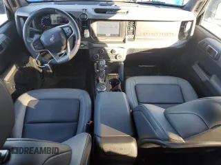 2023 Ford Bronco with VIN 1FMDE5BH0PLB15673, listed as a Copart auction lot 87823915 with 24,749 mi miles and Salvage Title. Bid and sale history available at DreamBid. Image 8.
