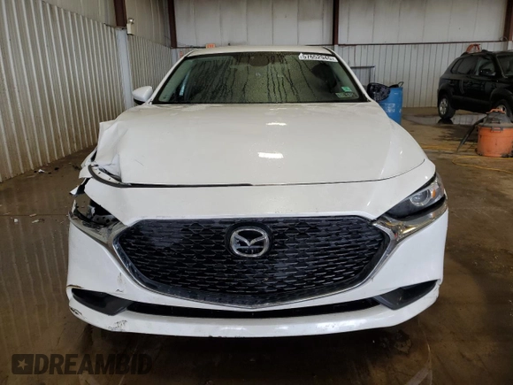 2019 Mazda 3 z VIN 3MZBPABL4KM114291, wystawiony jako Copart lot #57652945 z przebiegiem 148 644 mil mil oraz Szkoda całkowita • Salvage title. Historia ofert i sprzedaży dostępna na DreamBid. Obrazek 5.
