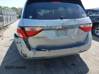 2011 Honda Odyssey EX-L with VIN 5FNRL5H62BB075789, listed as a IAAI auction lot 42035746 with 238,616 mi miles and . Bid and sale history available at carsss.com. Image 6.
