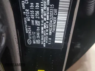 2012 Hyundai Genesis 3.8L z VIN KMHGC4DD4CU203315, wystawiony jako Copart lot #51670355 z przebiegiem 270 937 mil mil oraz Szkody całkowita. Historia ofert i sprzedaży dostępna na DreamBid. Obrazek 12.