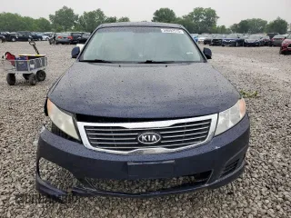 2010 Kia Optima LX z VIN KNAGG4A80A5398981, wystawiony jako Copart lot #59092515 z przebiegiem 153 524 mil mil oraz Szkoda całkowita • Salvage title. Historia ofert i sprzedaży dostępna na DreamBid. Obrazek 5.